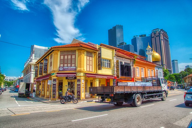 Street corner on Northbridge Road with traditional shop houses and Sultan Mosque in Singapore
