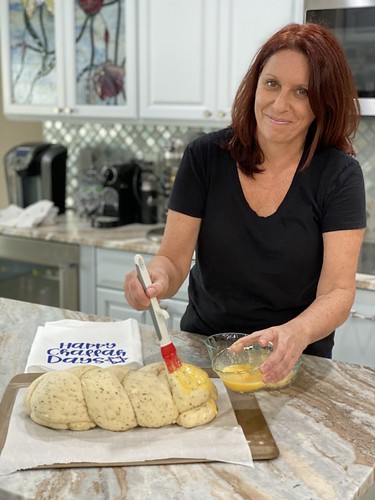 Author Shari Wallack making challah. From Your Summer Must-Read: From Hell to Challah: Rising from Fragile to Fearless, One Grain at a Time