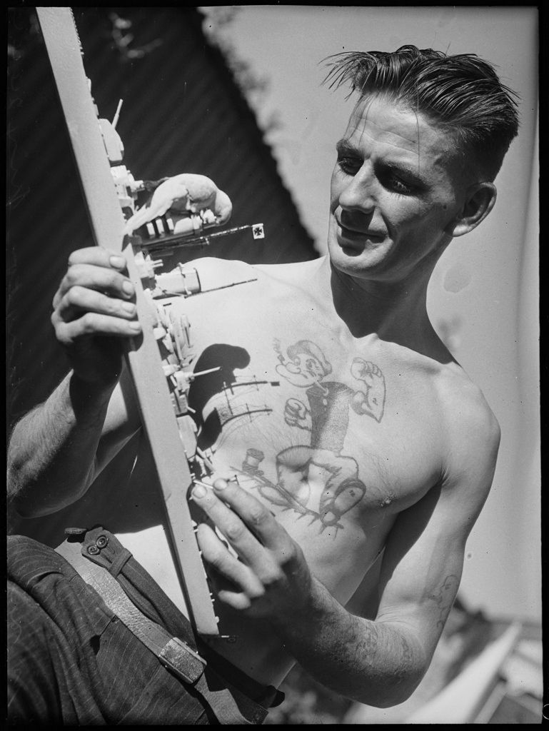 Tattooed man with bird, W. Silk of Paddington, Sydney, 24 April 1940