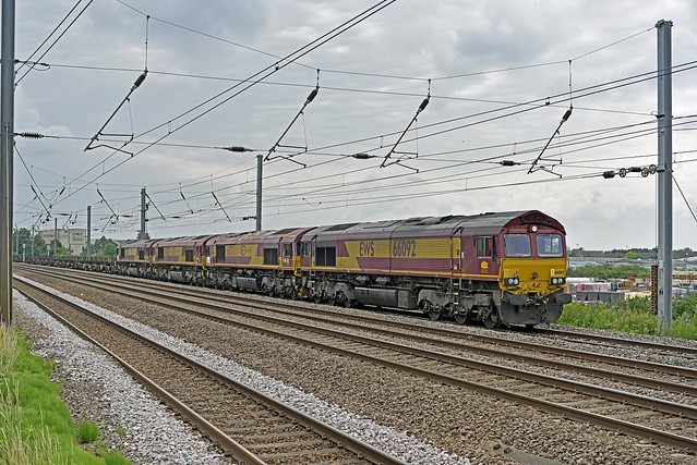 66092 with Eurosheds 66073, 66032 & 66205 4E26 Dollands Moor - Scunthorpe passes Sandy 09.07.2021