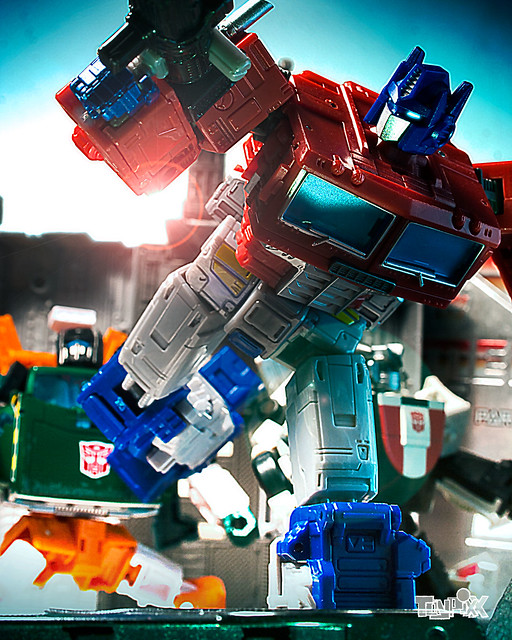 Transformers Earthrise Optimus Prime, Transformers Earthrise Hoist, and Transformers Earthrise Wheeljack