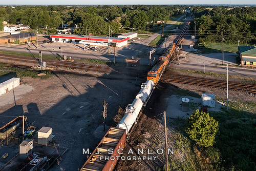 BNSF 7678 | GE ES44DC | BNSF Thayer South Subdivision by M.J. Scanlon, A BNSF mixed freight rolls through Hoxie, Arkansas, on the Thayer South Sub as it passes over the tr