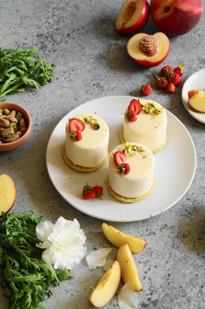 strawberry, white peach and pistachio mousse cakes