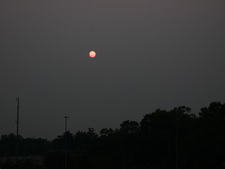 Western Wildfires Red Sun in the Midwest