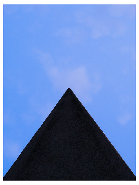 Blue with black triangle