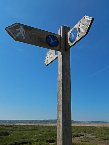 Directional footpath sign to Llanddona Beach on Anglesey Island in Wales