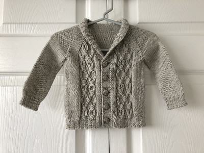 Lise (Mattedcat) test knit this classic, cabled Alistair Cardigan for Sheila Toy Stromberg!