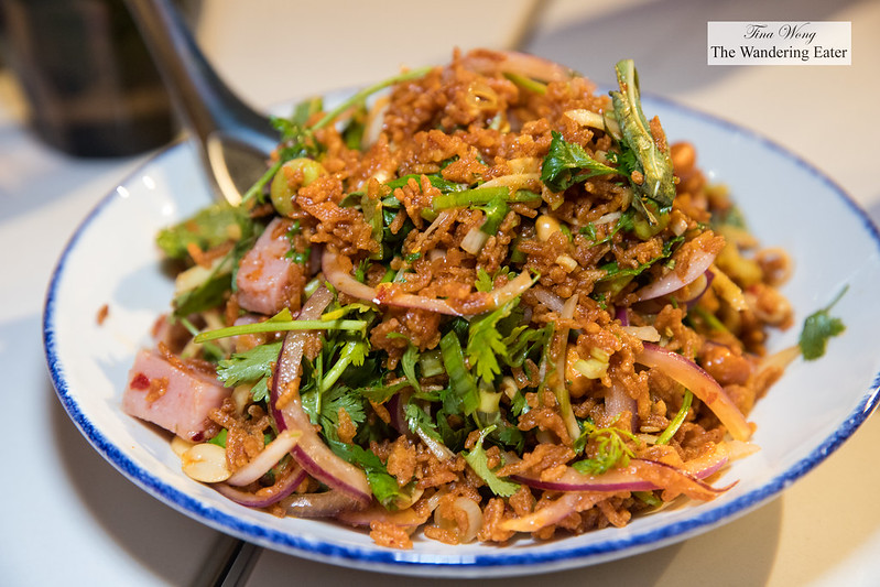 Moo Sadoong or ‘startled pig’ - Grilled pork, Thai basil, lemongrass, garlic, fish sauce, lime, chili, onions,cilantro, rice powder