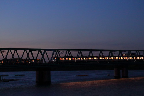 metro train japan chiba tozailine railway bridge edoriver river water sunset sundown
