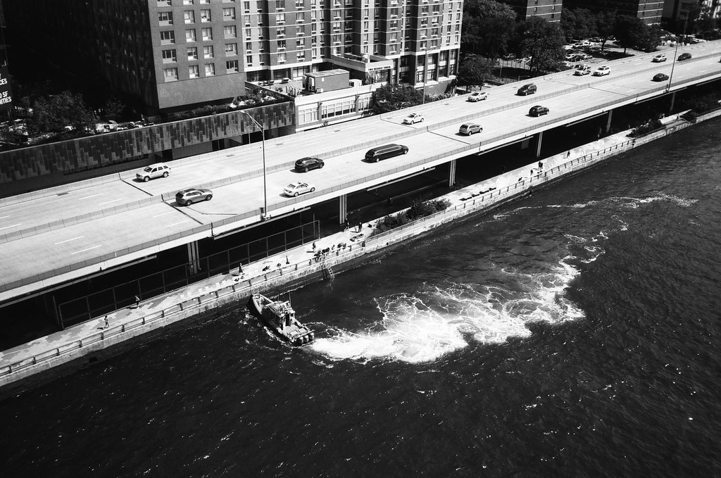 Boat seen from Manhattan Bridge, NYC