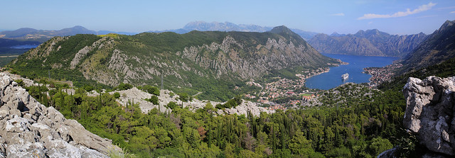 Nestled in a valley between the mountains, overlooking the Bay of Kotor