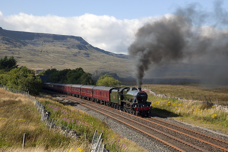 With thirteen coaches on the hook, the sound from Jubilee No.45699 'Galatea' was reverberating off the fells surrounding the valley of Mallerstang and the summit of the Settle Carlisle at Ais Gill. An incredible performance for such a heavy load on a 5X, she was digging in, showing no signs of weakness.