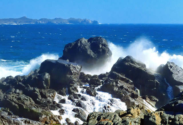 Wave hitting coastal rocks, Pichidangui, Chile
