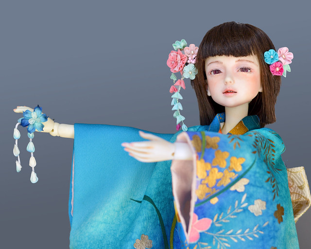 Yurie in blue furisode with pink and blue kanzashi.