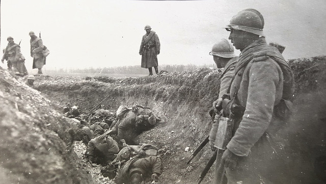 French soldiers look at their dead comrades during an assault estimated 1917