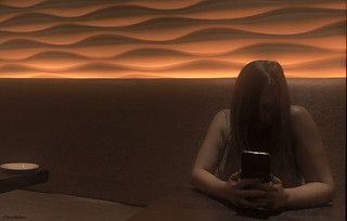 girl alone on iphone | by Tony - Walton