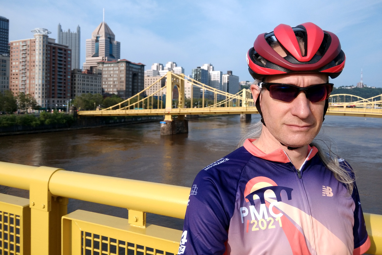 Modeling the 2021 PMC jersey in downtown Pittsburgh.