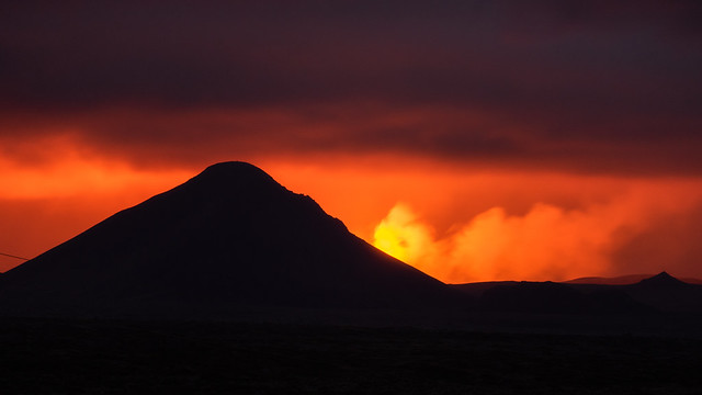Mt. Keilir with an active volcano behind it