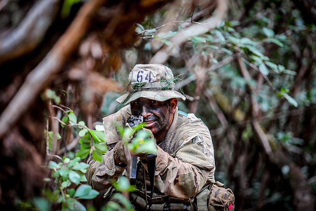 US Army Soldier patrols during Jungle Operations Training Course in Hawaii