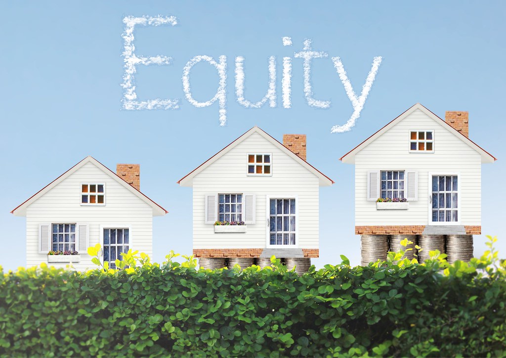 Equity Release - a row of houses with the words equity written on them