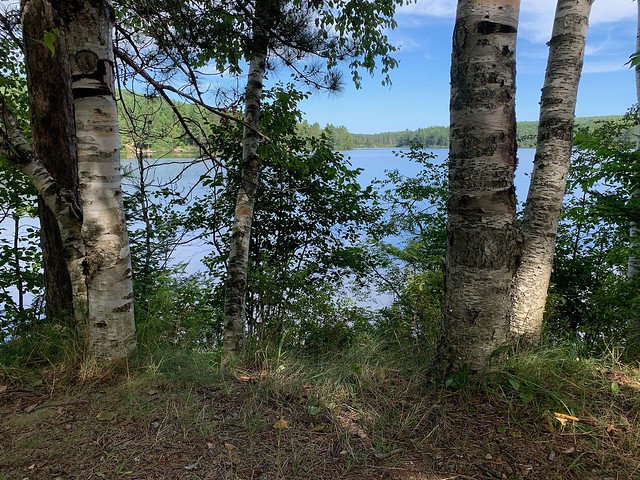 A beautiful view through the trees over lake St. Peter from our campsite in Lake St Peter Provincial Park , Martin’s photographs , town of Lake St.Peter , Hastings Highlands , Ontario , Canada , August 16. 2021