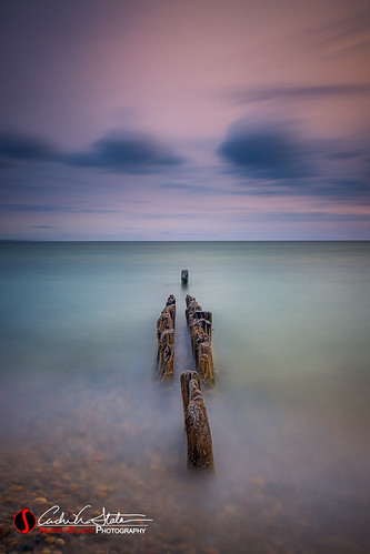 Michigan Split by andrewslaterphoto, A split row of the old piers along the shores of Whitefish Point in Upper Peninsula Michigan.

Pleas