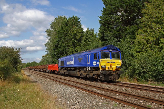 66148 passes Bullo Pill working 6V92 Corby - Margam empty steel cariers 24-08-2021