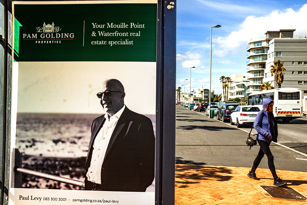 Pam Golding Properties ad at bus stop on 8-31-21--Cape Town