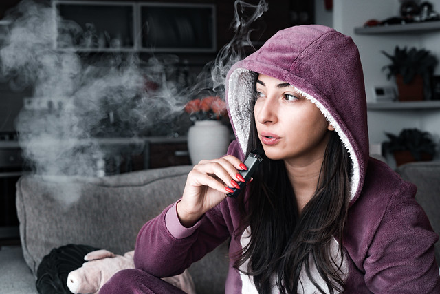Woman Vaping on an Electronic Cigarette