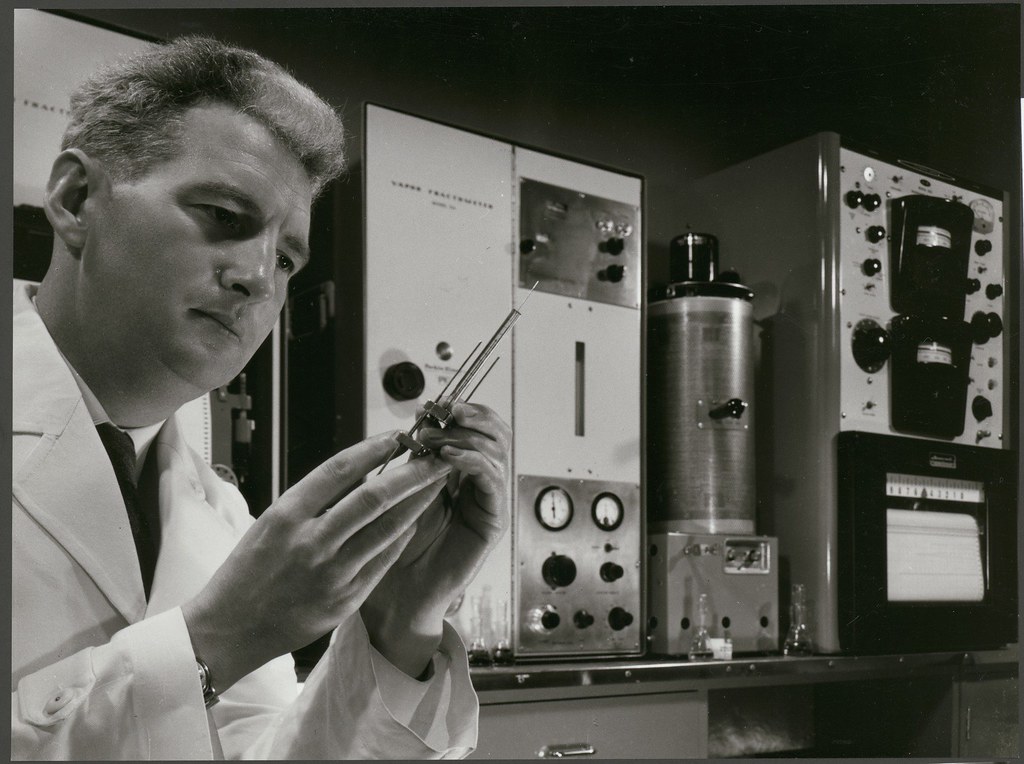 Technician using a spectrophotometer, Balm Paints Research Laboratories, 14 McNaughton Road, Clayton, 1961