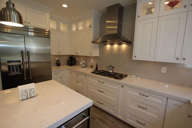 Transitional #DesignBuild #KitchenRemodel Custom white #Cabinets #HardwoodFloor in Huntington Beach #OrangeCounty https://www.aplushomeimprovements.com/portfolio_page/137-huntington-beach-transitional-design-build-kitchen-remodel-with-custom-cabinets/