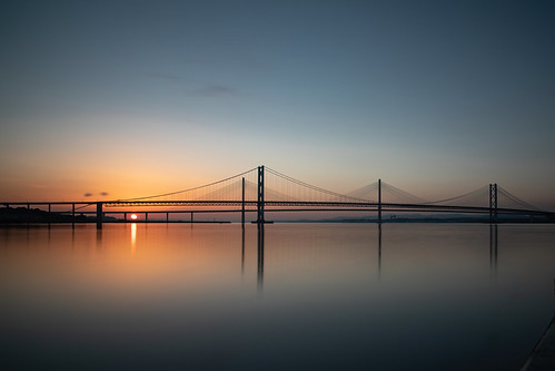 Last Light, Last night by ian_woodhead1, Sun going down behind the Forth Road Bridge and Queensferry Crossingforthroadbridge queensferrycross