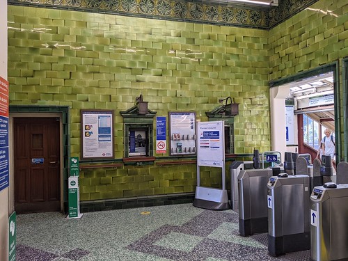 Barons Court Station, green glazed tiles.