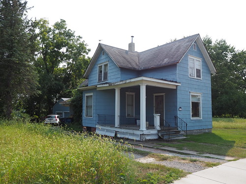 Condemned house at 1710 W 10th St on September 11, 2021