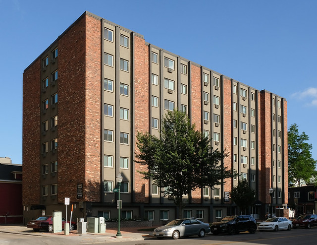 These are the Saxony Apartments, from 1966. The building's paintjob of light brown and dark brown is from 2017.
