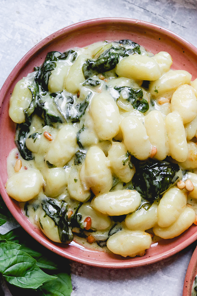 Creamed Spinach Gnocchi Bake with Toasted Pine Nuts