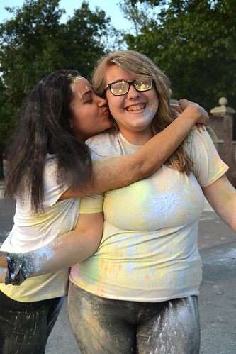 Sisters hug after participating in the Elimination of Prejudice Color Walk