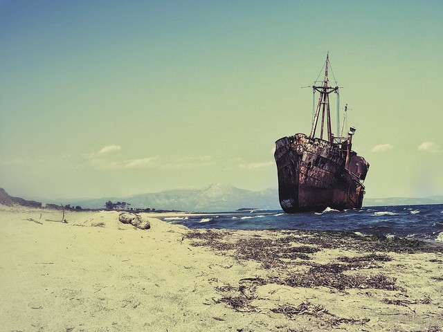 On a sandy beach, like those of her childhood