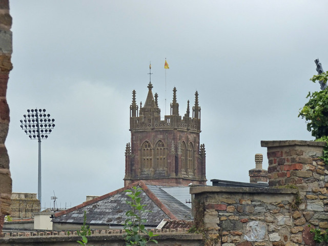 Floodlight at Somerset County Cricket Club and West Tower of St Mary Magdalene's Church from  Castle Green, Taunton