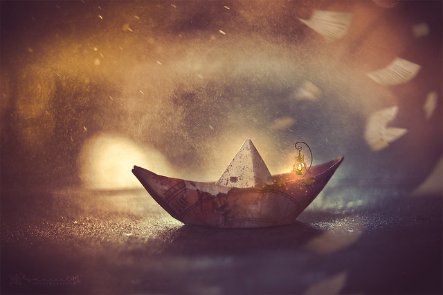 .Paper boat in a magical tempest.