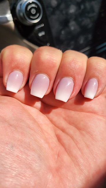 Purple to white ombre short coffin nails.