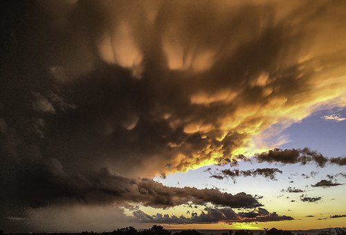 newmexico albbuquerque sunset rainstorm clouds