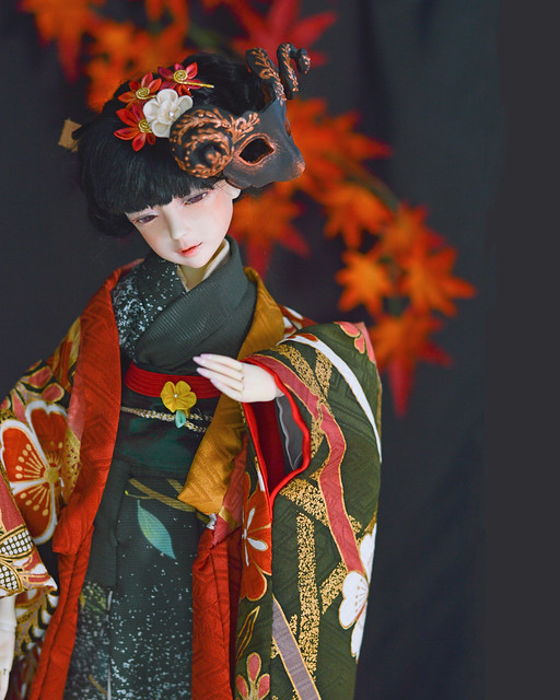 Yurie in fall kimono with black goat mask.