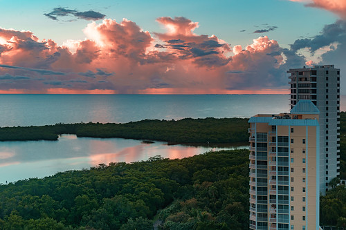 usa naples ocean sea reflection water colors clouds hotel coast florida pastel