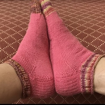 Connie (knitnut246) finished a pair of pink shortie socks using Plain Vanilla Socks pattern by K McKiernan.