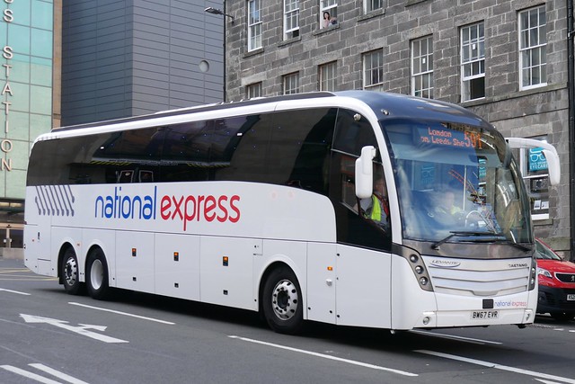 Bruce of Salsburgh Scania K450EB6 Caetano Levante BV67EVR, in National Express livery, operating service 591 to London at Elder Street after departing Edinburgh Bus Station on 24 September 2021.