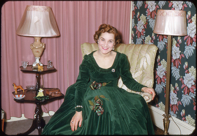 Woman in green dress, USA, 1950s