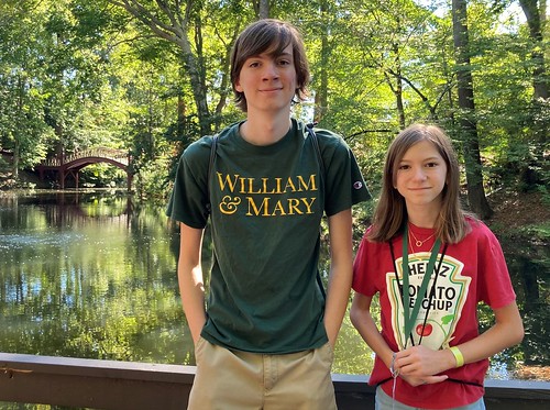 Luke Sayre ‘25 visits with his sister near the Crim Dell.