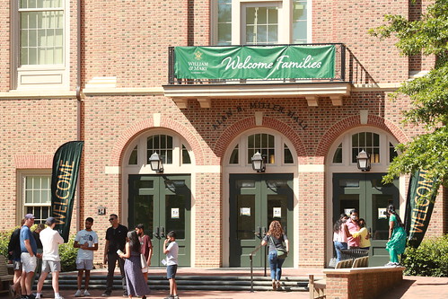 A banner on Alan B. Miller Hall welcomes families.