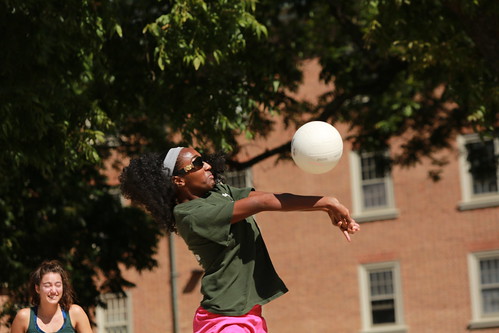 Family Weekend participants play volleyball.